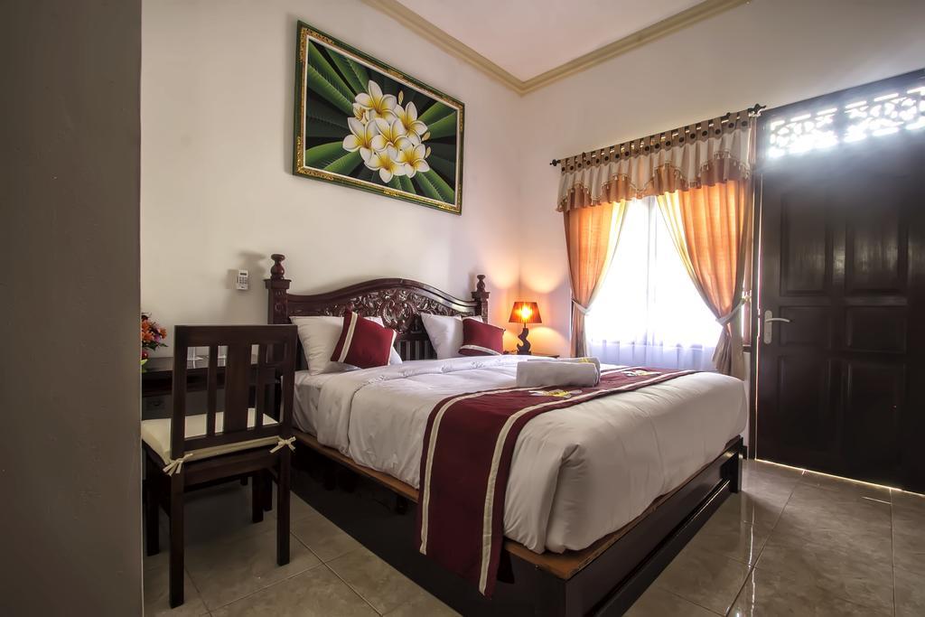 Frangipani Homestay Nusa Dua  Szoba fotó
