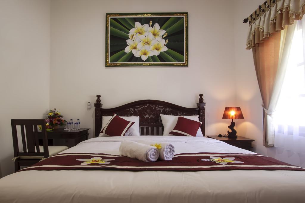 Frangipani Homestay Nusa Dua  Szoba fotó